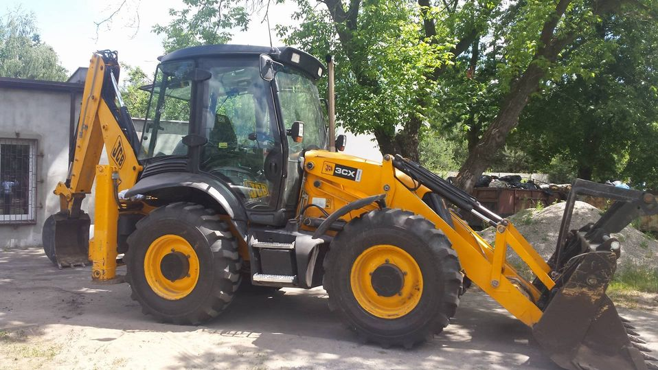 Żółta Koparka marki JCB